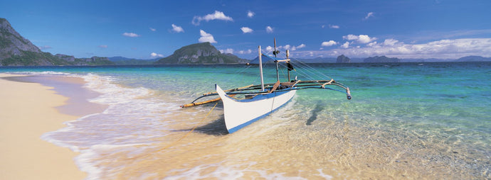 Fishing boat moored on the beach, Palawan, Philippines