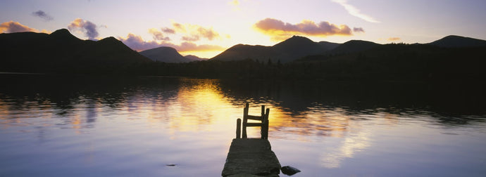 Reflection of mountains in a lake, Derwent Water, English Lake District, Cumbria, England