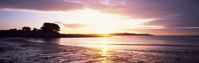 Sunrise over the sea, Kerpenhir Beach, Locmariaquer, Morbihan, Brittany, France