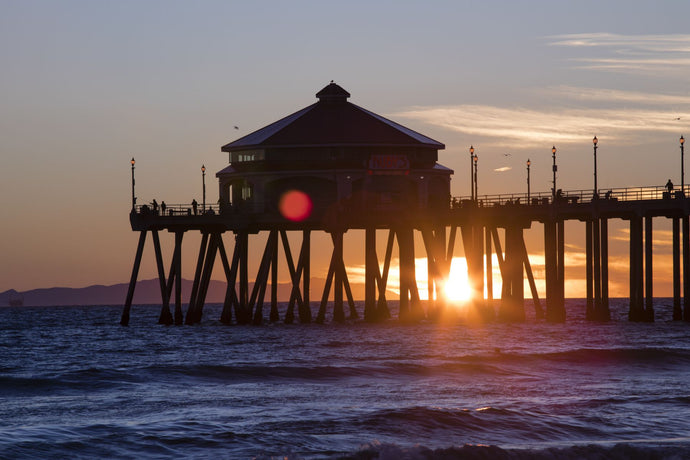 Pier in the Pacific Ocean at dusk, Huntington Beach Pier, Huntington Beach, California, USA