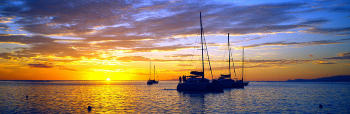 Silhouette of sailboats in the ocean at sunset, Tahiti, Society Islands, French Polynesia