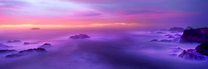 Fog reflected in the sea at sunset