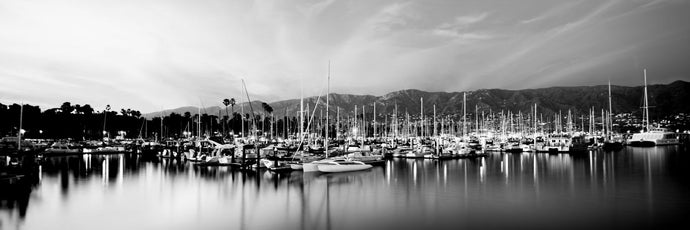 Boats moored in harbor at sunset, Santa Barbara Harbor, Santa Barbara County, California, USA