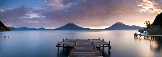 Jetty in a lake with a mountain range in the background, Lake Atitlan, Santa Cruz La Laguna, Western Highlands, Guatemala