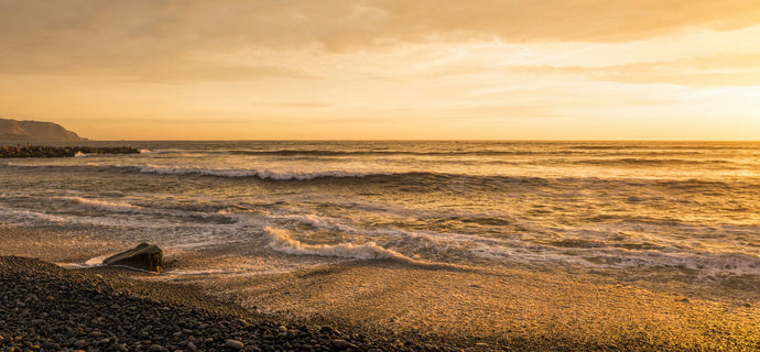 Surf on beach at dusk, Playa Waikiki, Miraflores District, Lima, Peru