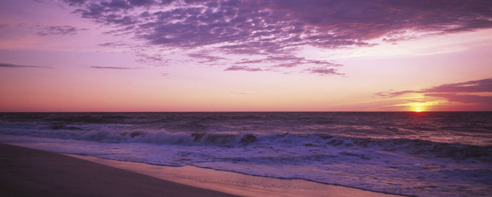 Clouds over an ocean at dawn