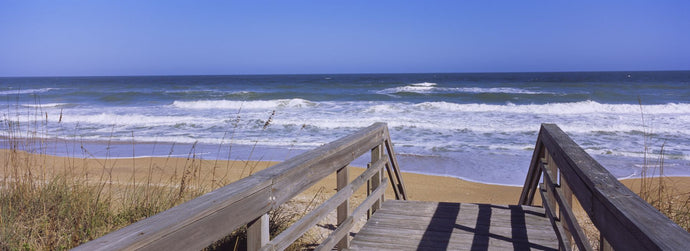 Boardwalk leading towards a beach, Playlinda Beach, Canaveral National Seashore, Titusville, Florida, USA